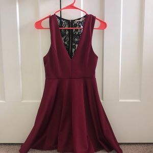 Maroon Low V mini dress w/ lace detail on back.